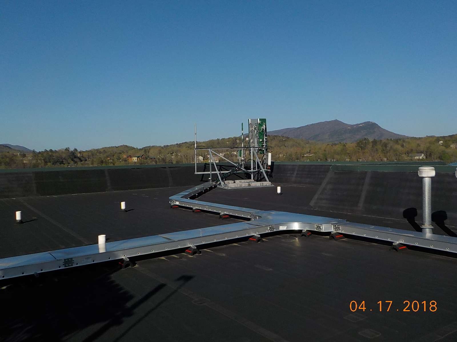 Henderson Springs rooftop antenna frame during the documented six-foot spacing visit