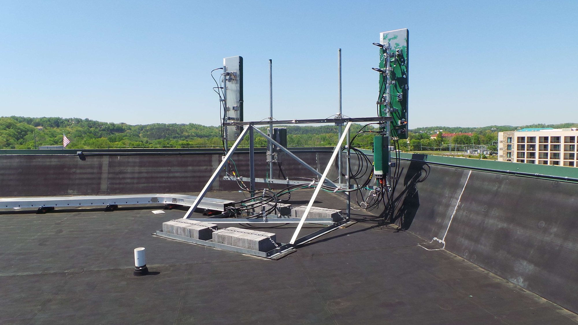 Henderson Springs antenna pair restored to its original rooftop configuration