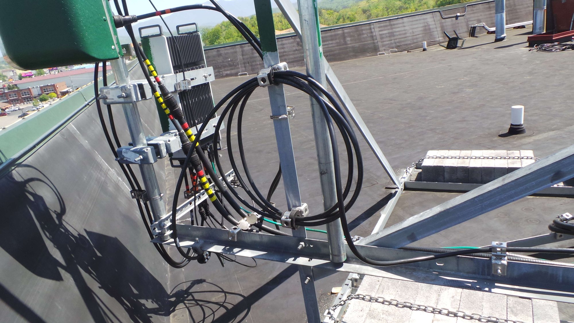 Henderson Springs rooftop RF jumpers dressed and routed around the antenna frame